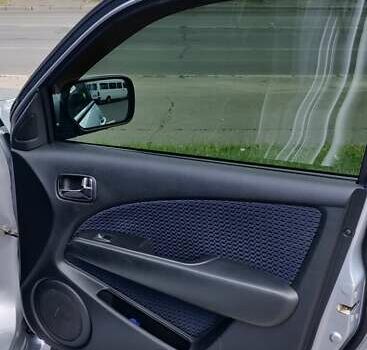 Серый Мицубиси Аутлендер, объемом двигателя 2.38 л и пробегом 323 тыс. км за 6800 $, фото 14 на Automoto.ua