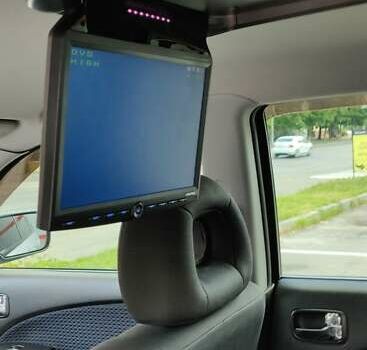 Серый Мицубиси Аутлендер, объемом двигателя 2.38 л и пробегом 323 тыс. км за 6800 $, фото 10 на Automoto.ua