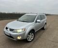 Серый Мицубиси Аутлендер, объемом двигателя 2 л и пробегом 200 тыс. км за 8300 $, фото 1 на Automoto.ua