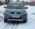 Серый Мицубиси Аутлендер, объемом двигателя 2.36 л и пробегом 311 тыс. км за 7500 $, фото 1 на Automoto.ua