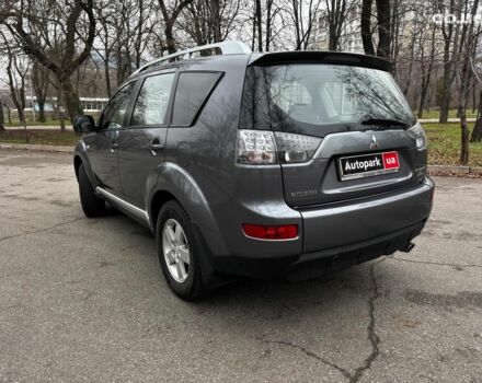 Серый Мицубиси Аутлендер, объемом двигателя 2.4 л и пробегом 237 тыс. км за 8490 $, фото 4 на Automoto.ua