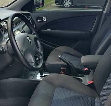 Серый Мицубиси Аутлендер, объемом двигателя 2.38 л и пробегом 323 тыс. км за 6800 $, фото 1 на Automoto.ua