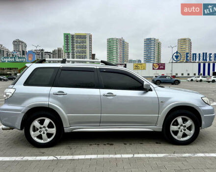 Серый Мицубиси Аутлендер, объемом двигателя 2 л и пробегом 209 тыс. км за 7200 $, фото 7 на Automoto.ua