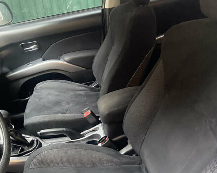 Серый Мицубиси Аутлендер, объемом двигателя 1.97 л и пробегом 229 тыс. км за 8500 $, фото 12 на Automoto.ua