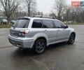 Сірий Міцубісі Аутлендер, об'ємом двигуна 2.38 л та пробігом 230 тис. км за 5700 $, фото 8 на Automoto.ua