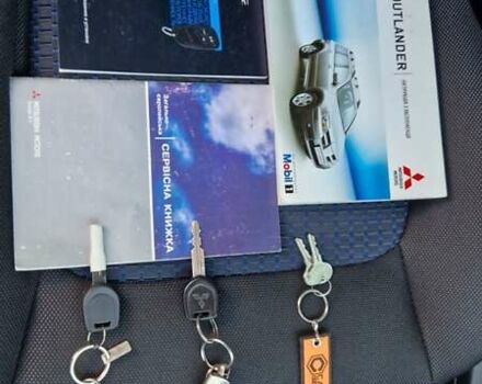 Серый Мицубиси Аутлендер, объемом двигателя 2 л и пробегом 157 тыс. км за 8300 $, фото 27 на Automoto.ua