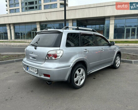 Серый Мицубиси Аутлендер, объемом двигателя 2.38 л и пробегом 81 тыс. км за 8700 $, фото 5 на Automoto.ua