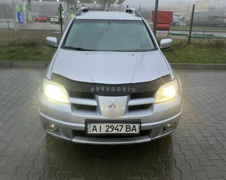 Сірий Міцубісі Аутлендер, об'ємом двигуна 2.4 л та пробігом 299 тис. км за 6300 $, фото 4 на Automoto.ua