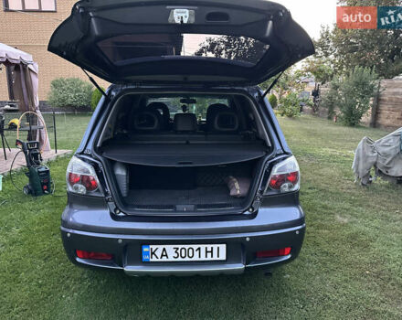 Сірий Міцубісі Аутлендер, об'ємом двигуна 2.38 л та пробігом 273 тис. км за 8000 $, фото 6 на Automoto.ua