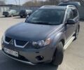 Серый Мицубиси Аутлендер, объемом двигателя 3 л и пробегом 264 тыс. км за 10500 $, фото 1 на Automoto.ua