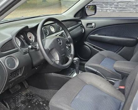 Сірий Міцубісі Аутлендер, об'ємом двигуна 2.38 л та пробігом 230 тис. км за 5500 $, фото 21 на Automoto.ua