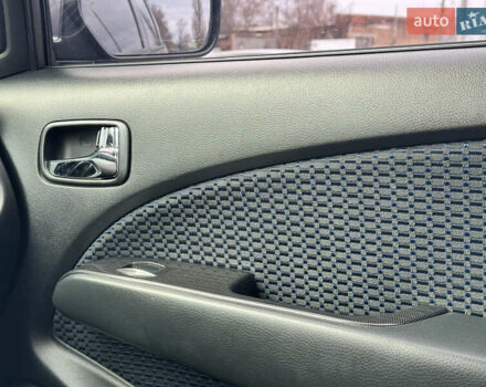 Серый Мицубиси Аутлендер, объемом двигателя 2.38 л и пробегом 254 тыс. км за 7300 $, фото 27 на Automoto.ua