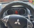 Серый Мицубиси Аутлендер, объемом двигателя 3 л и пробегом 232 тыс. км за 9200 $, фото 7 на Automoto.ua