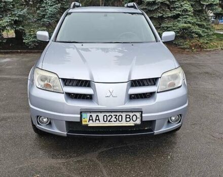 Сірий Міцубісі Аутлендер, об'ємом двигуна 2.38 л та пробігом 230 тис. км за 5700 $, фото 1 на Automoto.ua