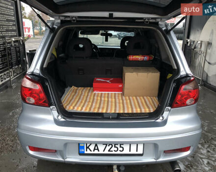 Серый Мицубиси Аутлендер, объемом двигателя 2 л и пробегом 170 тыс. км за 6950 $, фото 4 на Automoto.ua