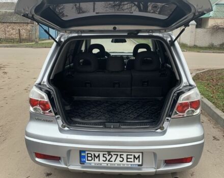 Серый Мицубиси Аутлендер, объемом двигателя 2 л и пробегом 247 тыс. км за 5999 $, фото 6 на Automoto.ua