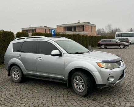 Серый Мицубиси Аутлендер, объемом двигателя 2.4 л и пробегом 285 тыс. км за 8500 $, фото 1 на Automoto.ua