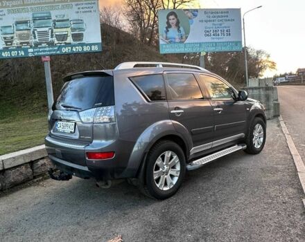 Серый Мицубиси Аутлендер, объемом двигателя 2.4 л и пробегом 321 тыс. км за 10000 $, фото 3 на Automoto.ua