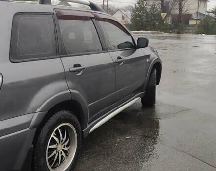 Серый Мицубиси Аутлендер, объемом двигателя 2 л и пробегом 200 тыс. км за 5999 $, фото 10 на Automoto.ua