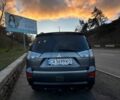Серый Мицубиси Аутлендер, объемом двигателя 2.4 л и пробегом 321 тыс. км за 10000 $, фото 4 на Automoto.ua