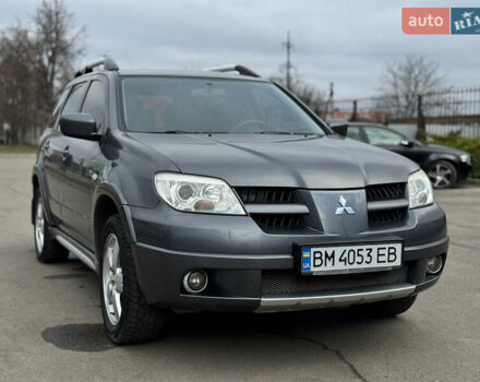 Серый Мицубиси Аутлендер, объемом двигателя 2.38 л и пробегом 254 тыс. км за 7300 $, фото 5 на Automoto.ua