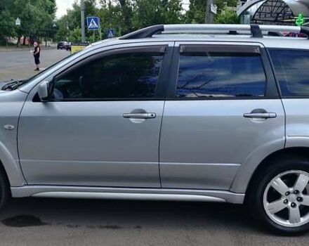 Серый Мицубиси Аутлендер, объемом двигателя 2.38 л и пробегом 323 тыс. км за 6800 $, фото 19 на Automoto.ua