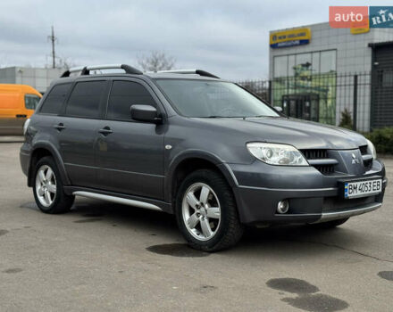 Серый Мицубиси Аутлендер, объемом двигателя 2.38 л и пробегом 254 тыс. км за 7300 $, фото 7 на Automoto.ua