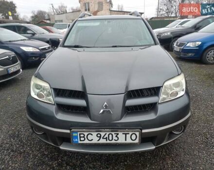 Серый Мицубиси Аутлендер, объемом двигателя 2 л и пробегом 232 тыс. км за 5950 $, фото 2 на Automoto.ua