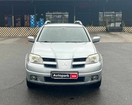 Сірий Міцубісі Аутлендер, об'ємом двигуна 2.4 л та пробігом 324 тис. км за 6890 $, фото 1 на Automoto.ua
