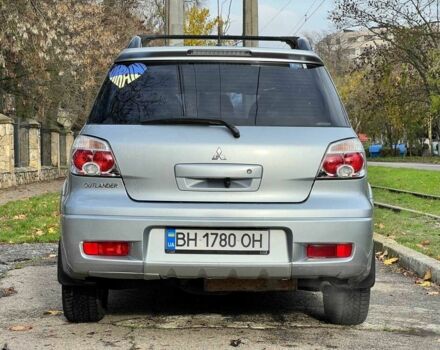 Серый Мицубиси Аутлендер, объемом двигателя 2.4 л и пробегом 170 тыс. км за 6900 $, фото 7 на Automoto.ua