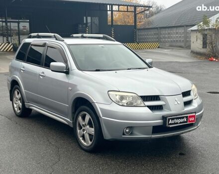 Серый Мицубиси Аутлендер, объемом двигателя 2.4 л и пробегом 324 тыс. км за 6890 $, фото 2 на Automoto.ua