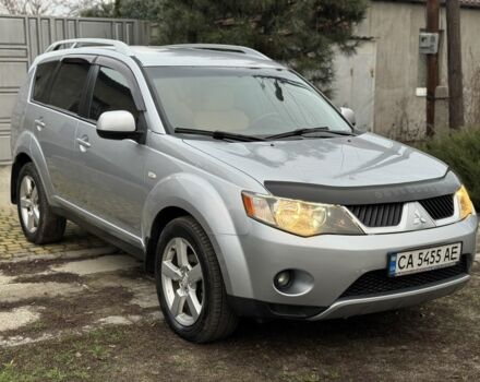 Серый Мицубиси Аутлендер, объемом двигателя 2.4 л и пробегом 241 тыс. км за 7350 $, фото 2 на Automoto.ua