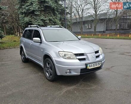 Сірий Міцубісі Аутлендер, об'ємом двигуна 2.38 л та пробігом 230 тис. км за 5700 $, фото 11 на Automoto.ua