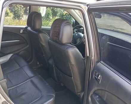 Серый Мицубиси Аутлендер, объемом двигателя 2.35 л и пробегом 342 тыс. км за 6900 $, фото 21 на Automoto.ua