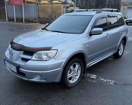 Сірий Міцубісі Аутлендер, об'ємом двигуна 2.4 л та пробігом 190 тис. км за 7500 $, фото 1 на Automoto.ua