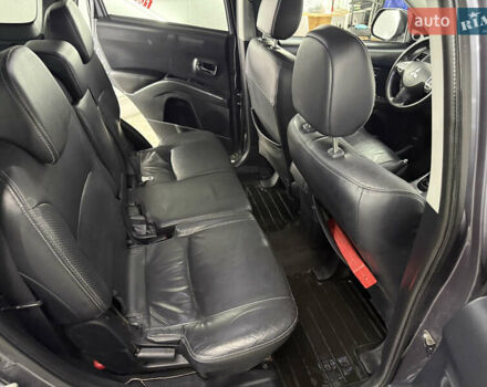 Сірий Міцубісі Аутлендер, об'ємом двигуна 2 л та пробігом 235 тис. км за 8950 $, фото 42 на Automoto.ua