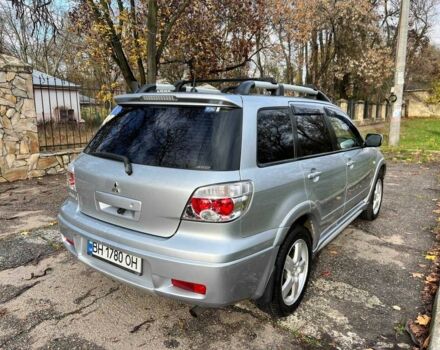 Серый Мицубиси Аутлендер, объемом двигателя 2.4 л и пробегом 170 тыс. км за 6900 $, фото 8 на Automoto.ua