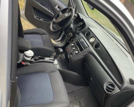 Сірий Міцубісі Аутлендер, об'ємом двигуна 2.38 л та пробігом 209 тис. км за 7460 $, фото 2 на Automoto.ua