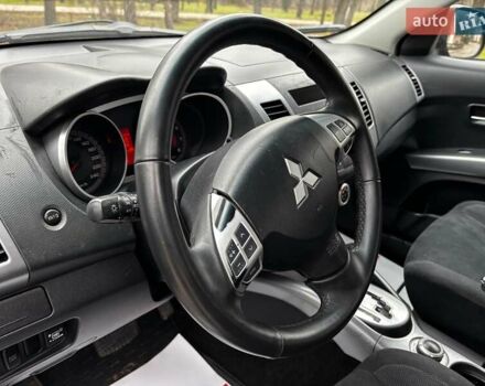 Серый Мицубиси Аутлендер, объемом двигателя 2.4 л и пробегом 237 тыс. км за 8490 $, фото 25 на Automoto.ua