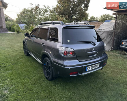 Сірий Міцубісі Аутлендер, об'ємом двигуна 2.38 л та пробігом 273 тис. км за 8000 $, фото 5 на Automoto.ua