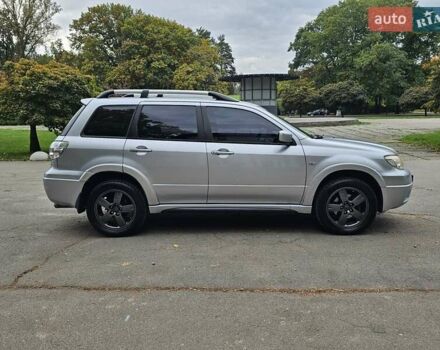 Сірий Міцубісі Аутлендер, об'ємом двигуна 2.38 л та пробігом 200 тис. км за 5600 $, фото 5 на Automoto.ua