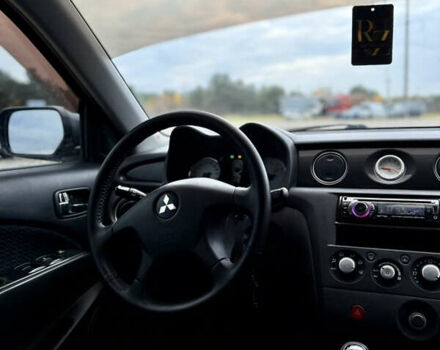 Серый Мицубиси Аутлендер, объемом двигателя 2 л и пробегом 199 тыс. км за 5999 $, фото 19 на Automoto.ua