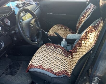 Серый Мицубиси Аутлендер, объемом двигателя 2 л и пробегом 218 тыс. км за 6100 $, фото 2 на Automoto.ua