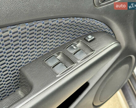 Серый Мицубиси Аутлендер, объемом двигателя 2.38 л и пробегом 254 тыс. км за 7300 $, фото 21 на Automoto.ua