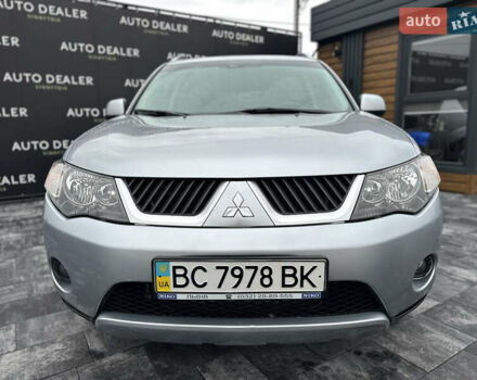 Серый Мицубиси Аутлендер, объемом двигателя 2.4 л и пробегом 61 тыс. км за 11300 $, фото 1 на Automoto.ua