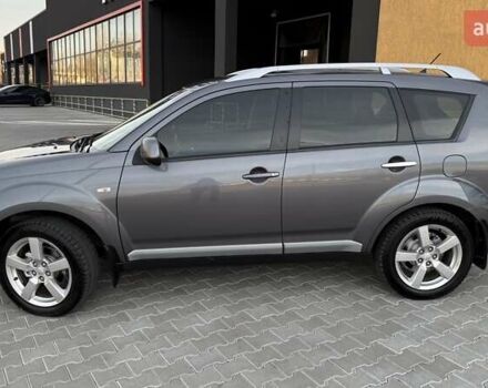 Серый Мицубиси Аутлендер, объемом двигателя 2.4 л и пробегом 174 тыс. км за 9599 $, фото 3 на Automoto.ua