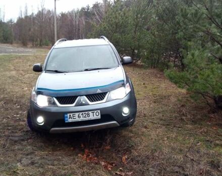 Серый Мицубиси Аутлендер, объемом двигателя 2.4 л и пробегом 223 тыс. км за 8800 $, фото 1 на Automoto.ua