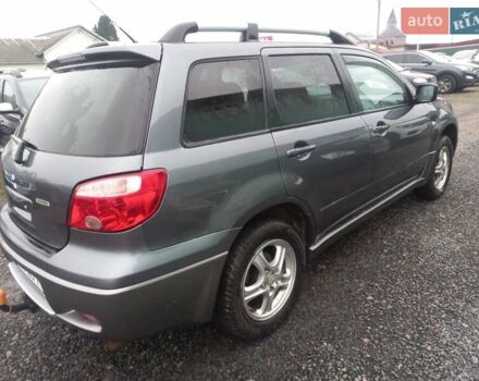 Серый Мицубиси Аутлендер, объемом двигателя 2 л и пробегом 232 тыс. км за 5950 $, фото 3 на Automoto.ua