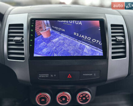 Серый Мицубиси Аутлендер, объемом двигателя 2.4 л и пробегом 61 тыс. км за 11300 $, фото 57 на Automoto.ua