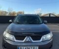 Серый Мицубиси Аутлендер, объемом двигателя 2.18 л и пробегом 287 тыс. км за 10200 $, фото 1 на Automoto.ua